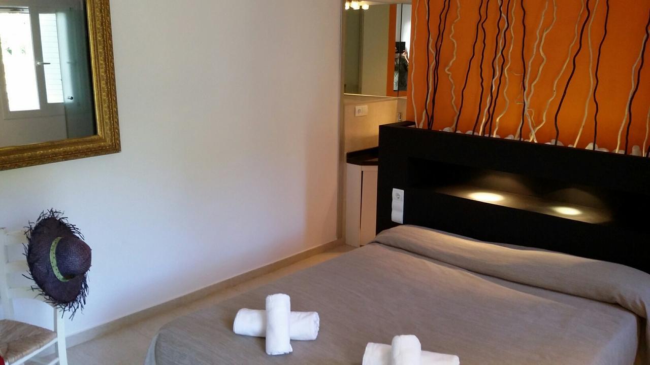 Apartamentos Colomar Санта Еулалия дел Рио Екстериор снимка